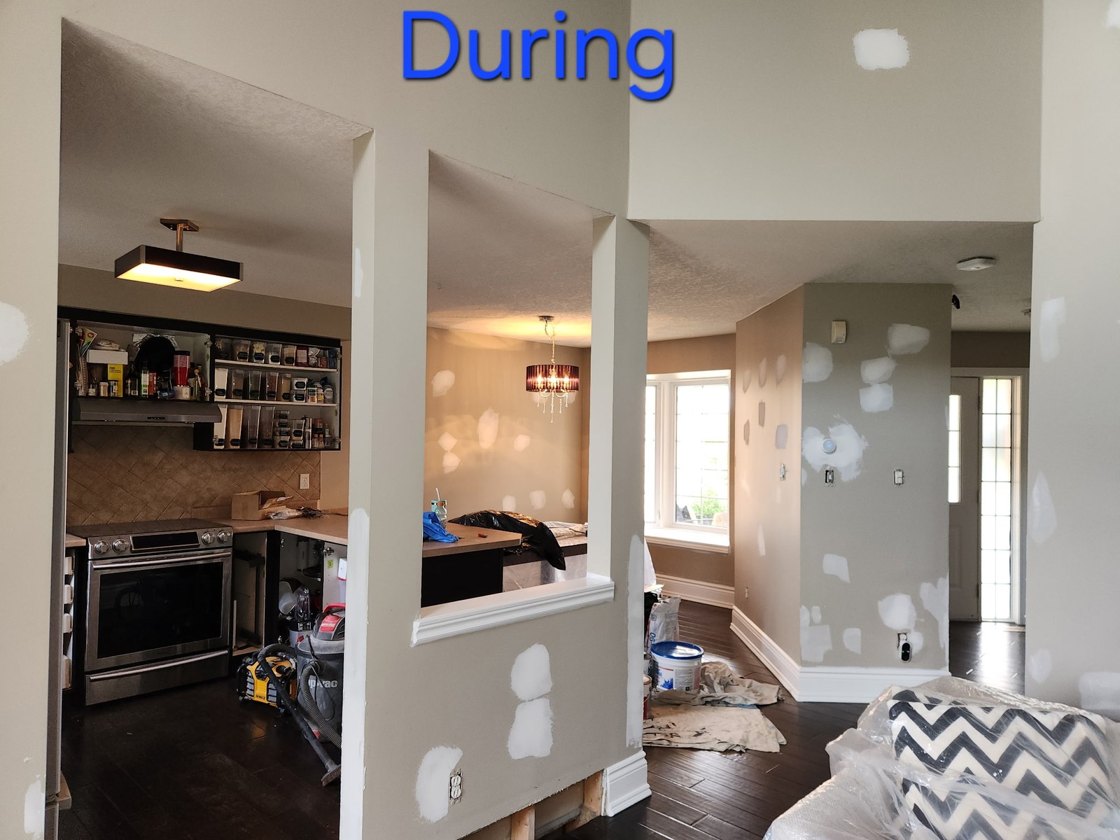 Detailed wall patching and preparation throughout the interior before painting
